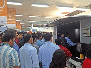 Attendees of the Codelco Technical Standards Exhibition enjoy a demonstration of the PRO3 Advanced Equipment Simulator.