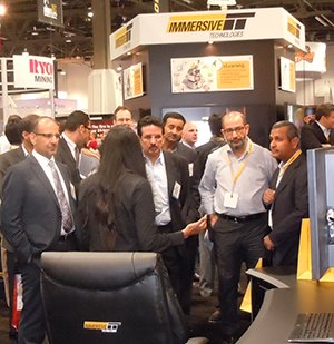 Representatives from Ma’aden visit the Immersive Technologies stand at MINExpo 2012 in Las Vegas.
