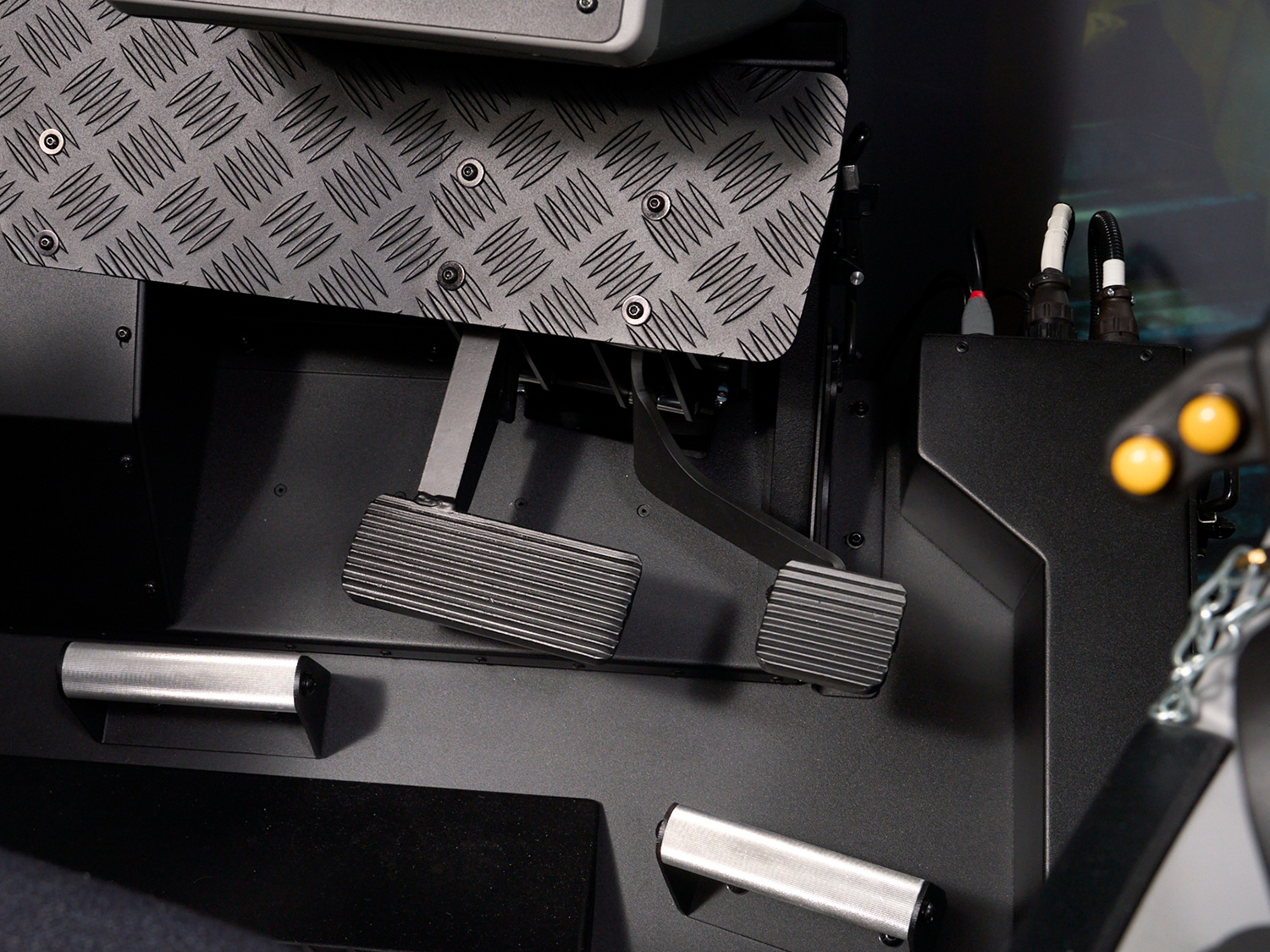 Service brake and deceleration pedals