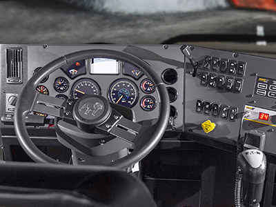 Mack Granite Vocational Light Vehicle -  Steering wheel and switches simulating a cabin with the steering wheel on the left side
