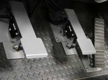 Komatsu 830E-AC - Throttle and retarder/service brake pedals